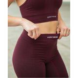 Conjunto Move Burdeos • Biker • Top deportivo
